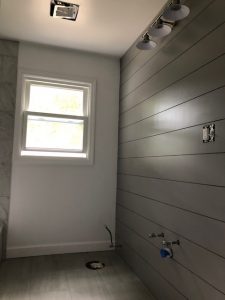 Shiplap wall in bathroom demolition and remodel