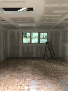 Sheetrock and tape in a barn remodel